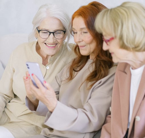 Three old women videochatting